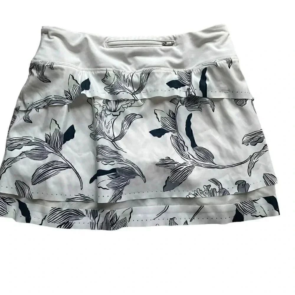 ATHLETA Print Laser Running Tennis Sporty Women's White Floral Midi Skirt Skort
